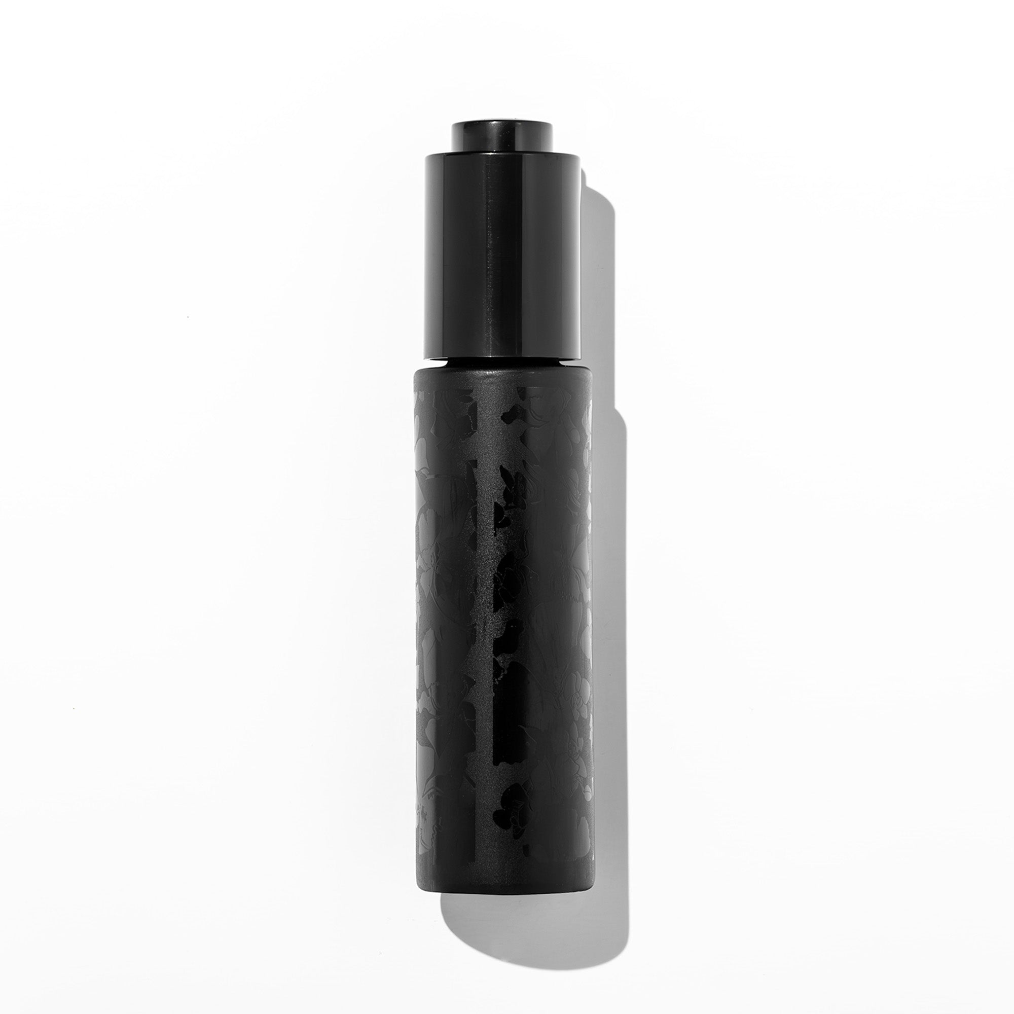 Elixir Noir Face Oil bottle, back label—30 mL serum-like face oil with lightweight, non-greasy finish